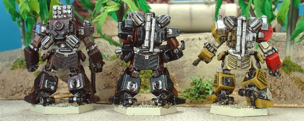 Painted back views of Mad Dog R, Bear, and Den Mother.
