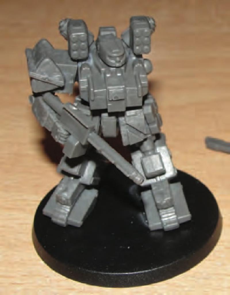 Glue shoulder to torso and then lower arm with gun to shoulder in desired pose